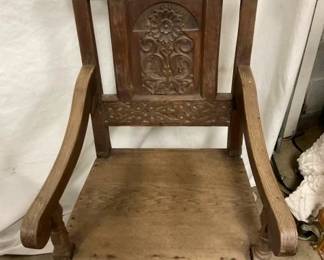PRIM. CHAIR W/CARVINGS