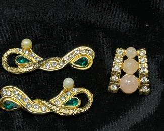 Misc Gold and green accessory pieces, $18. Misc Earring, $6