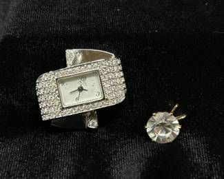 Suzanne Somers Pave Watch, $45. Large, 2 Carat Rhinestone pendant, $14