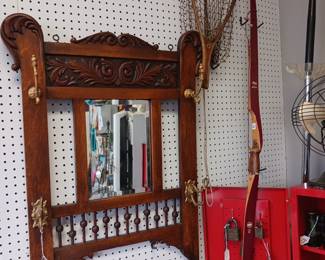 Antique beveled mirror with fret work  hat and coat hanger $125
