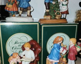 Avon figures with boxes 
