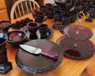 Ruby red cake plate, vases, creamer and sugar, large serving plates.