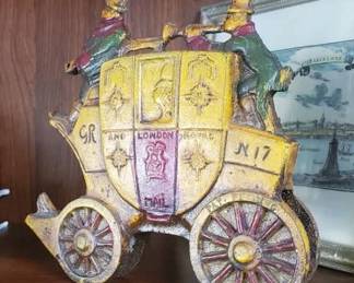 Interesting iron Carriage with footmen