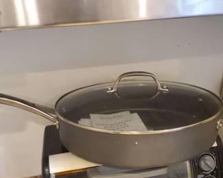 Lots of pots pans cooking ware