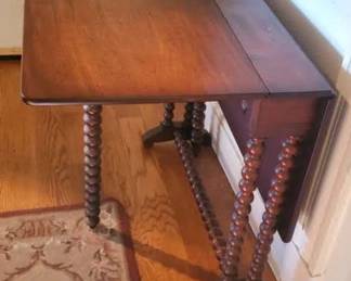 Narrow drop leaf tuckaway table
