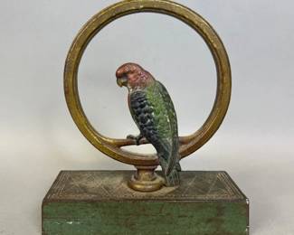 Bradley and Hubbard cast iron parrot on ring door stop with original paint