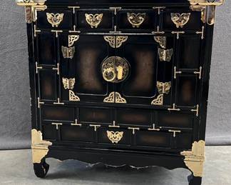 Small Asian lacquered chest with brass accents