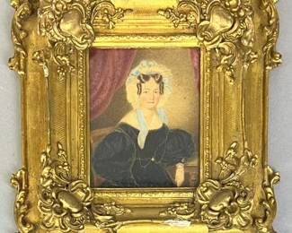 Miniature watercolor on paper of woman in bonnet in ornate Rococo frame