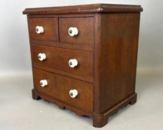 Miniature walnut chest of drawers