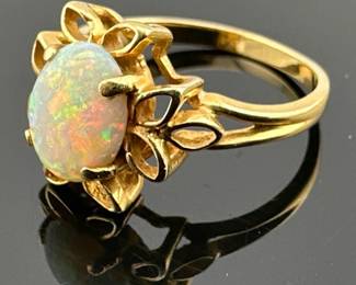 14kt opal ring with openwork halo setting