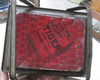 Vintage tine lunch box for Tiger Sweet Chewing tobacco from mid-20th century