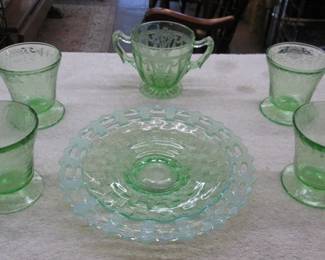 Set of green tinted glassware from 1930s to 1970s  Identified as Uranium Glass or also known as Vaseline Glass