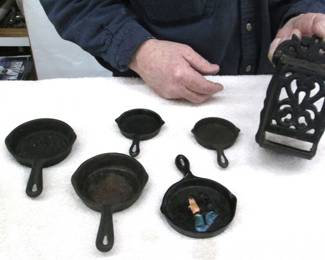 Vintage miniature case iron skillets, dating back to 1940s to 1950s