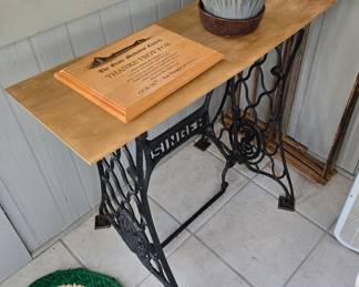 Singer sewing machine base table.
