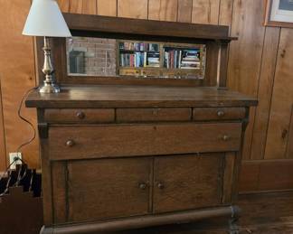 Antique sideboard with mirror.
