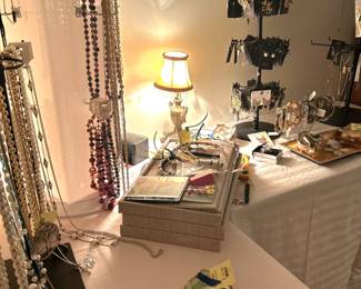 Pardon our mess, jewelry still being sorted on racks.