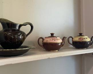 Brown pitcher and bowl sold.