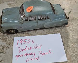 1950'S DEALERSHIP METAL CAR BANK