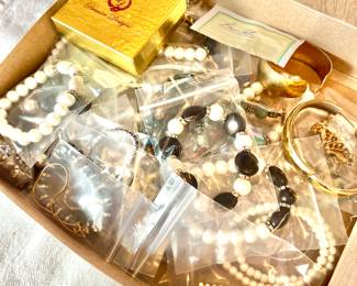 Variety of costume jewelry, watches and a few pieces of gold and sterling.