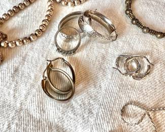 Variety of costume jewelry, watches and a few pieces of gold and sterling.