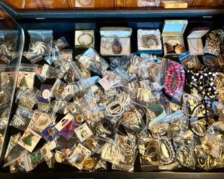 Variety of costume jewelry, watches and a few pieces of gold and sterling.