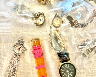 Variety of costume jewelry, watches and a few pieces of gold and sterling.