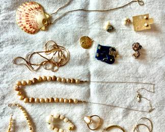 Variety of costume jewelry, watches and a few pieces of gold and sterling.