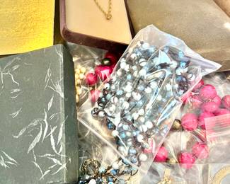 Variety of costume jewelry, watches and a few pieces of gold and sterling.