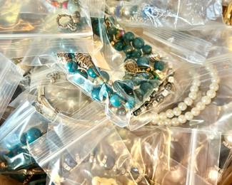 Variety of costume jewelry, watches and a few pieces of gold and sterling.