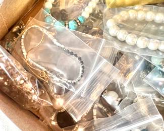 Variety of costume jewelry, watches and a few pieces of gold and sterling.