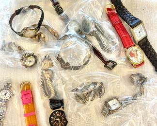 Variety of costume jewelry, watches and a few pieces of gold and sterling.