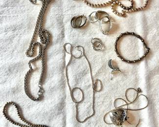 Variety of costume jewelry, watches and a few pieces of gold and sterling.