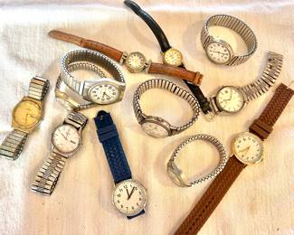 Variety of costume jewelry, watches and a few pieces of gold and sterling.