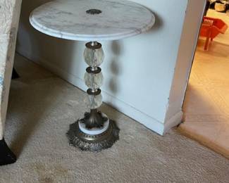 One of two marble topped tables