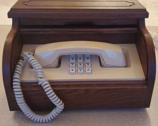 Western Electric desk phone in a roll-top desk look-a-like