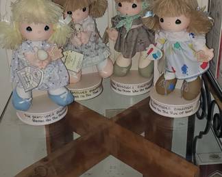 Precious Moments dolls with stand