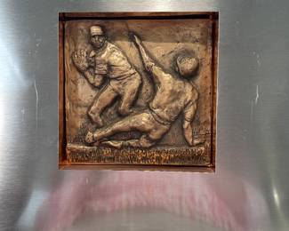 Sculptured Baseball players trimmed in copper in back