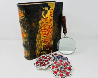 Decorative Lot - Storage Art Book, Magnifying Glass, and Ceramic Floral Coasters.