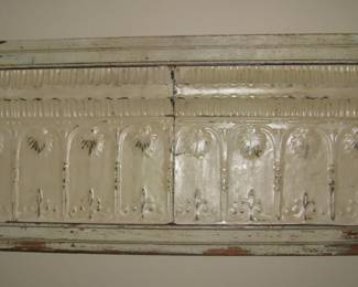 Framed tin ceiling pieces