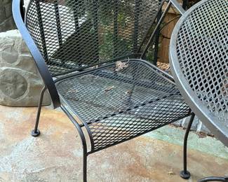wrought iron breakfast table with two wrought iron chairs