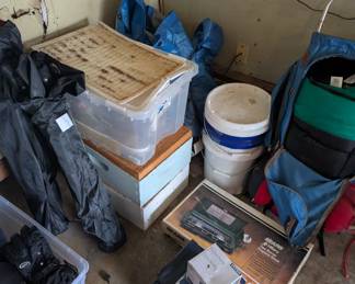 Beekeeping supplies and camping equipment. Vintage backpack