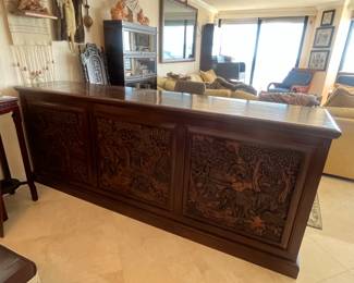 Gorgeous carved wood bar! Measures 8'L x 21.5"W x 38"H. Lots of storage on the back side (see next photos)