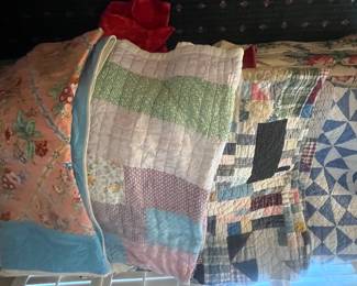 There is a nice selection of hand made quilts