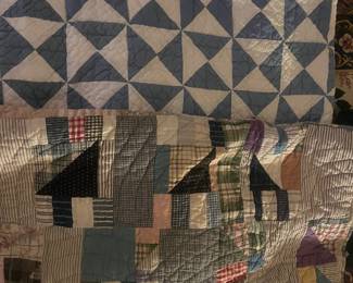 There is a nice selection of hand made quilts
