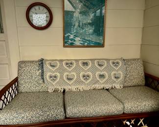 Cane three cushion sofa