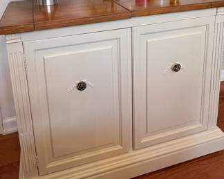 Cream color flip top bar cabinet with marble top