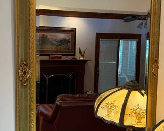 Gold framed wall mirror