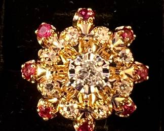 14K yellow gold cluster style ring with 9 diamonds (0.32 carats total weight) and 8 rubies (0.48 carets)