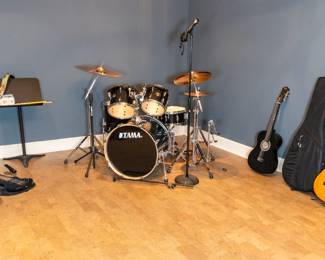 Guitars, banjo and drum kit