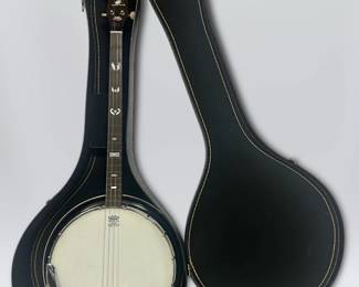 Harmony 4String Remo Weatherking Banjo And Case